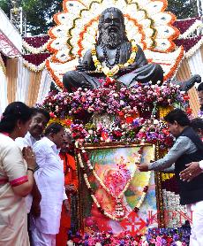 On the occasion of Valmiki Jayanti, DCM Dr G Paramesgwara garlands the statue of Maharshi Valmiki near at Vidhana Soudha in Bengaluru on Monday. -KPN 